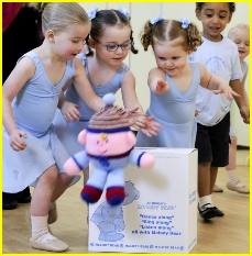 Photo of girls and boys dancing with Humpty Dumpty in a Little Bear Feet with Melody Bear class
