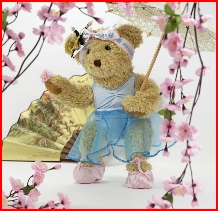 Melody Bear in her cherry blossom Japanese garden